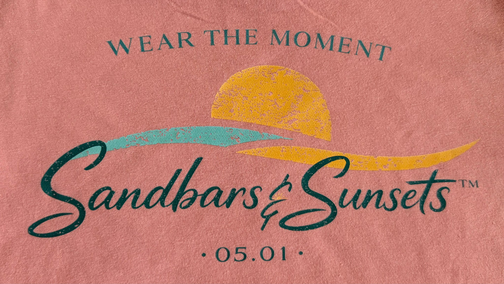 Wear the Moment™ 🌅 Launch Tee — 05.01